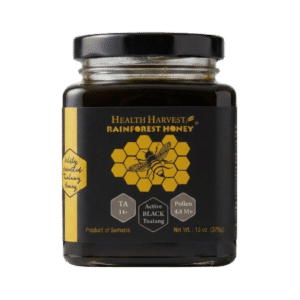 Health Harvest Premium Black Tualang Honey in a 375g (13 oz) glass jar with TA 14+, 4.8 million+ pollen count, harvested from Sumatra, Indonesia.