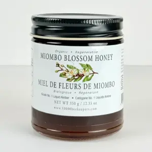 Front view of a 350 g jar of organic Miombo Blossom Honey